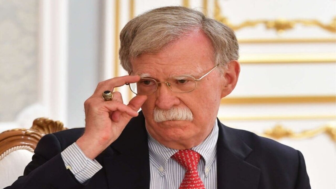 For John Bolton's Own Safety, His Mouth Should Stop Writing Checks His Bunghole Can't Cover.
