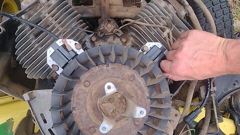 replacing spark plugs for a John Deere mower