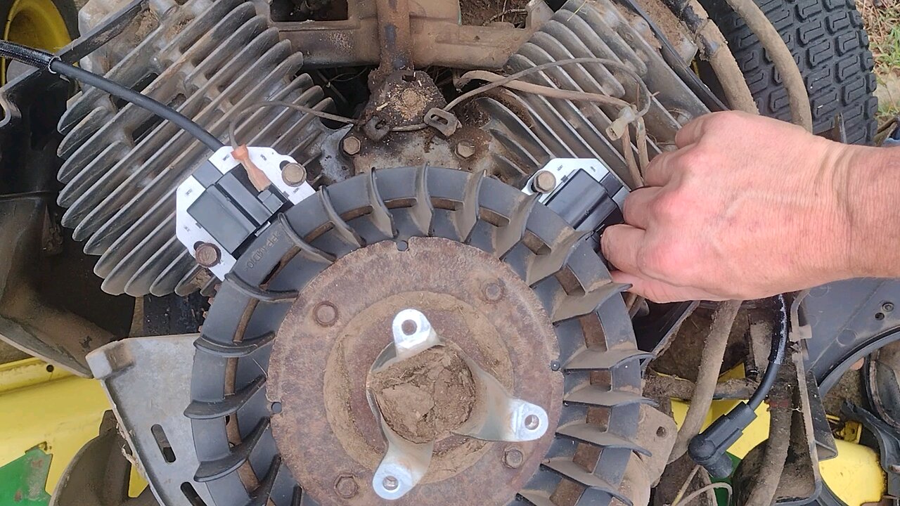 replacing spark plugs for a John Deere mower