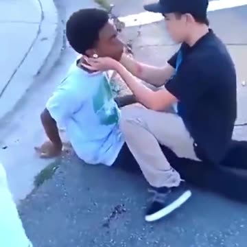 Bully gets knocked out in the street, people laugh and celebrate. Instant Karma