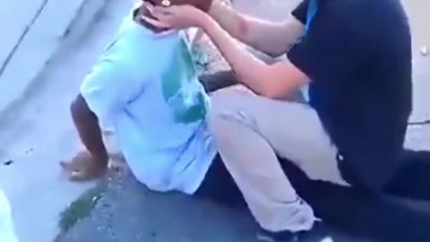 Bully gets knocked out in the street, people laugh and celebrate. Instant Karma
