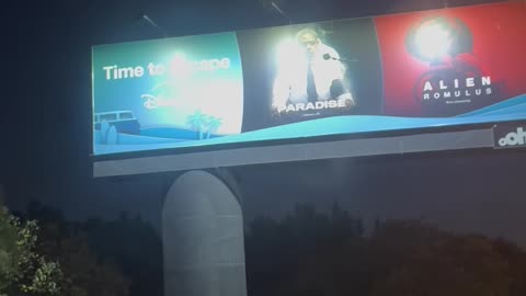 MK ultra billboard at Brisbane Airport
