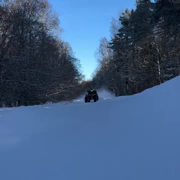 ATV rides 100 kmh in the snow