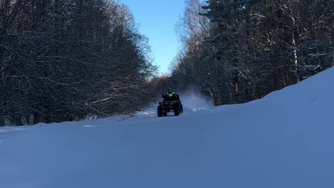 ATV rides 100 kmh in the snow