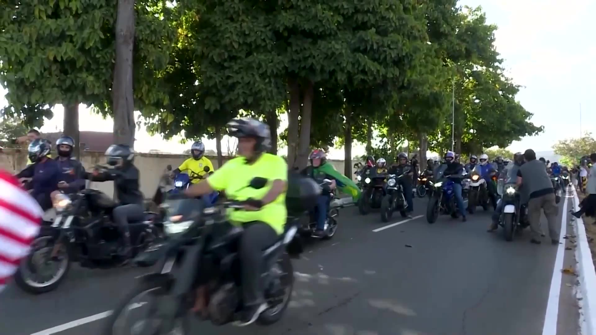 Hundreds join Bolsonaro in motorcycle rally amid coup trial tensions