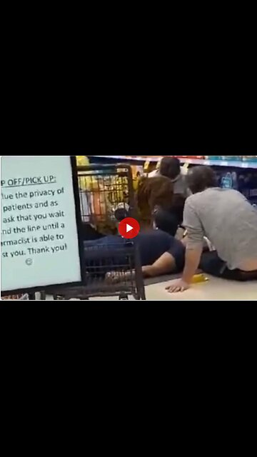 Man lying in the floor at Sobeys Pharmacy in Saskatoon, Canada - still lining up to be killed I see