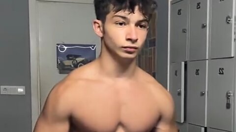15 years old Teen bodybuilder flexing muscles