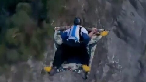 Global Index - @NoContextHumans Bro used a carpet instead of a wingsuit to BASE jump