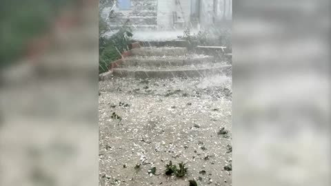 Hail crashes down during storm in southwest France