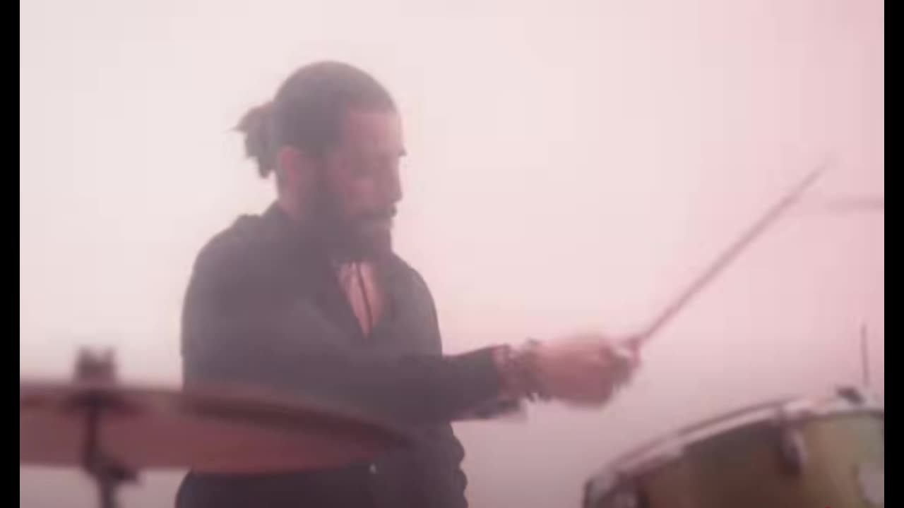 Jonathan Roumie appears in the video clip Arms around the Sun of Michael W Smith at drums