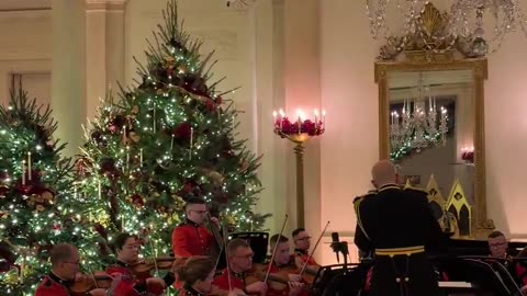 USMC Band plays as guests arrive to attend a concert by Andrea Bocelli