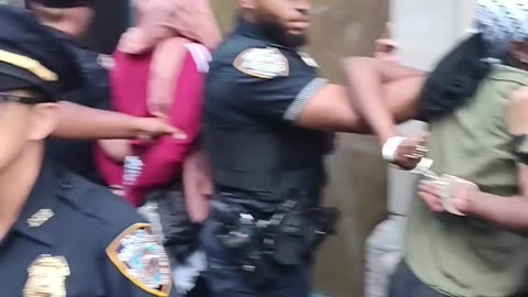 NYPD officers arrest peaceful ANTI-GENOCIDE women.