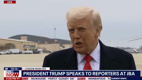 A reporter hit President Trump in the face with a fuzzy microphone