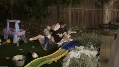 Wrestling Boys Crash Into Children's Plaything
