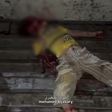 A Palestinian child was brutally killed in the Israeli bombing of a residential building (Graphic)