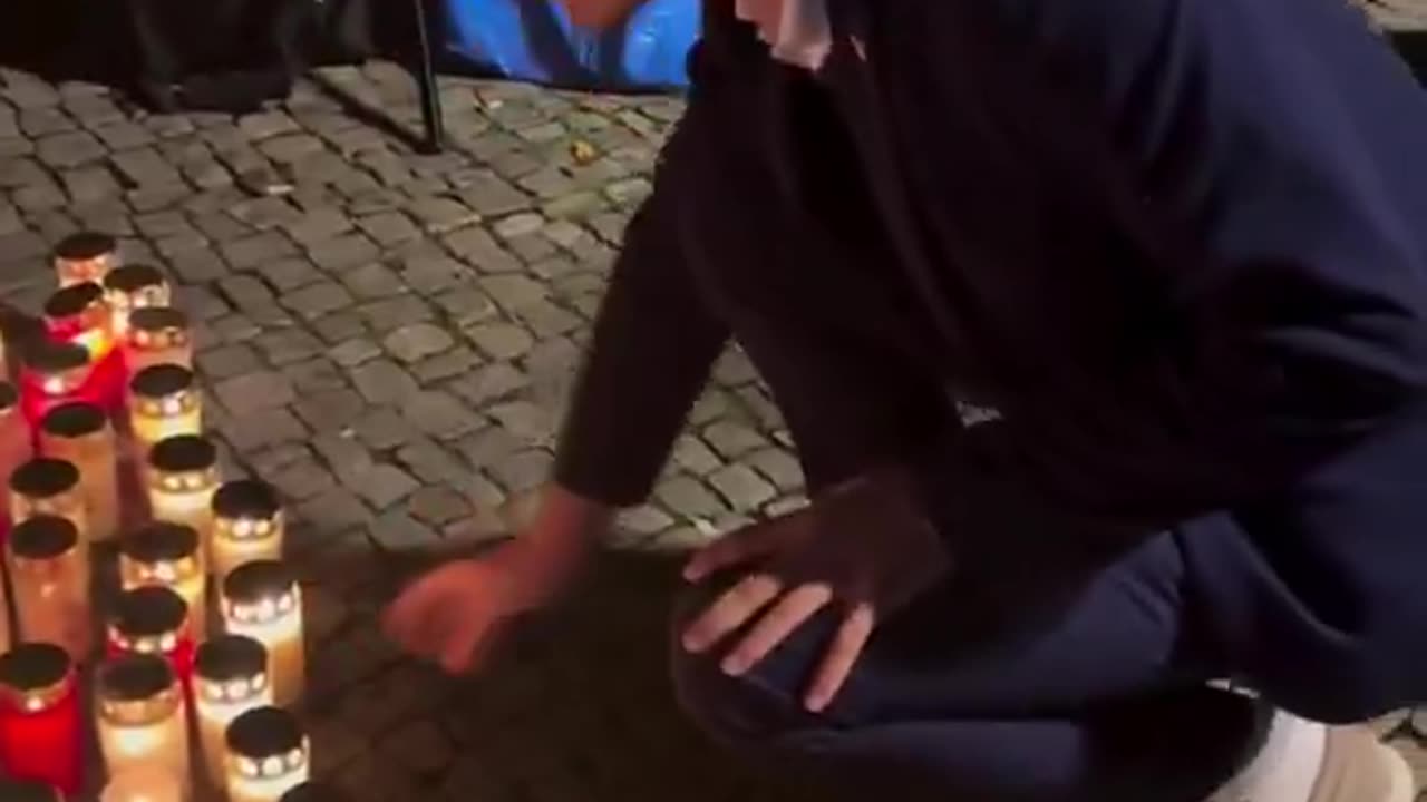 Germans gathered outside the U.S. Embassy in Berlin to hold a candlelight vigil for Charlie Kirk.