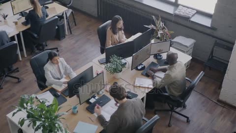 Top view of busy office room with employees diverse team.