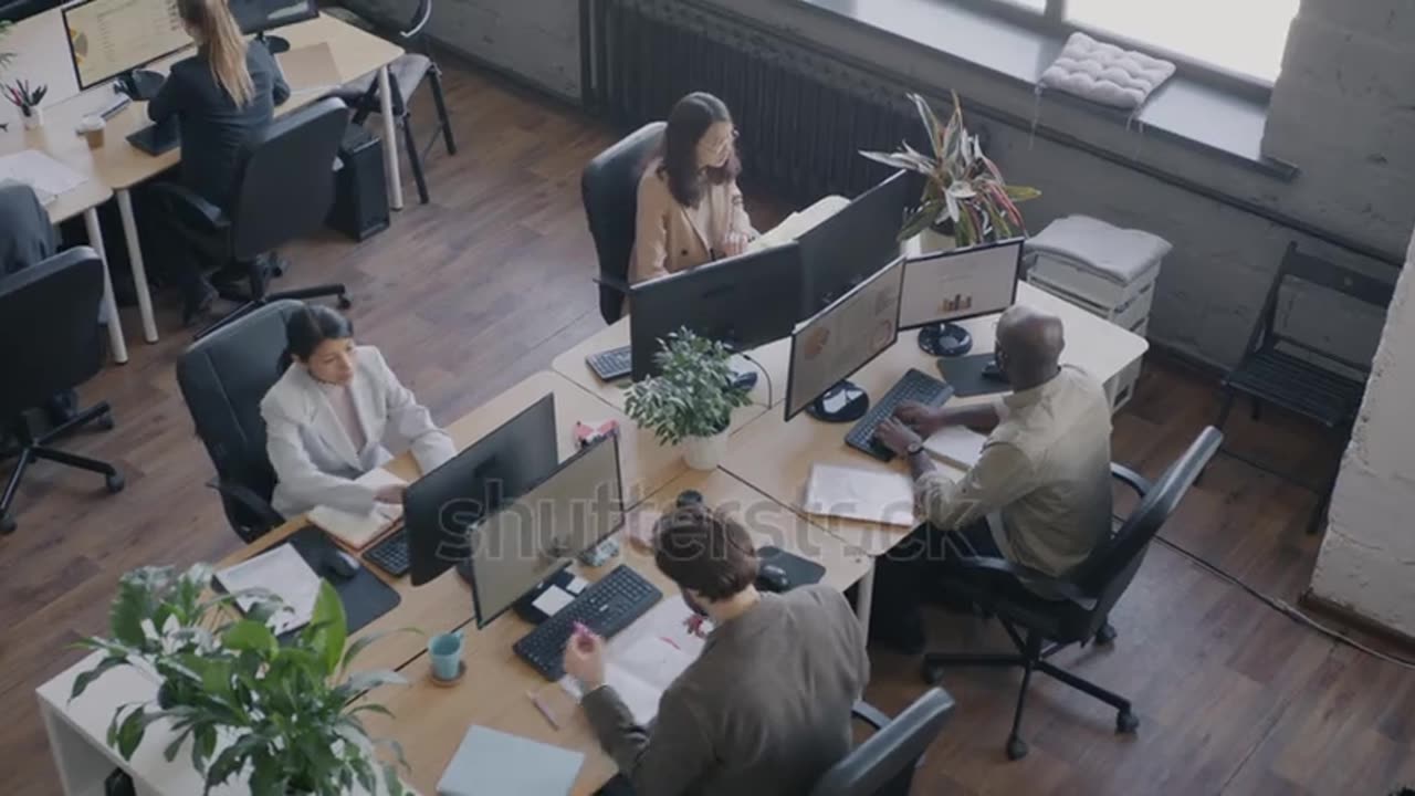 Top view of busy office room with employees diverse team.