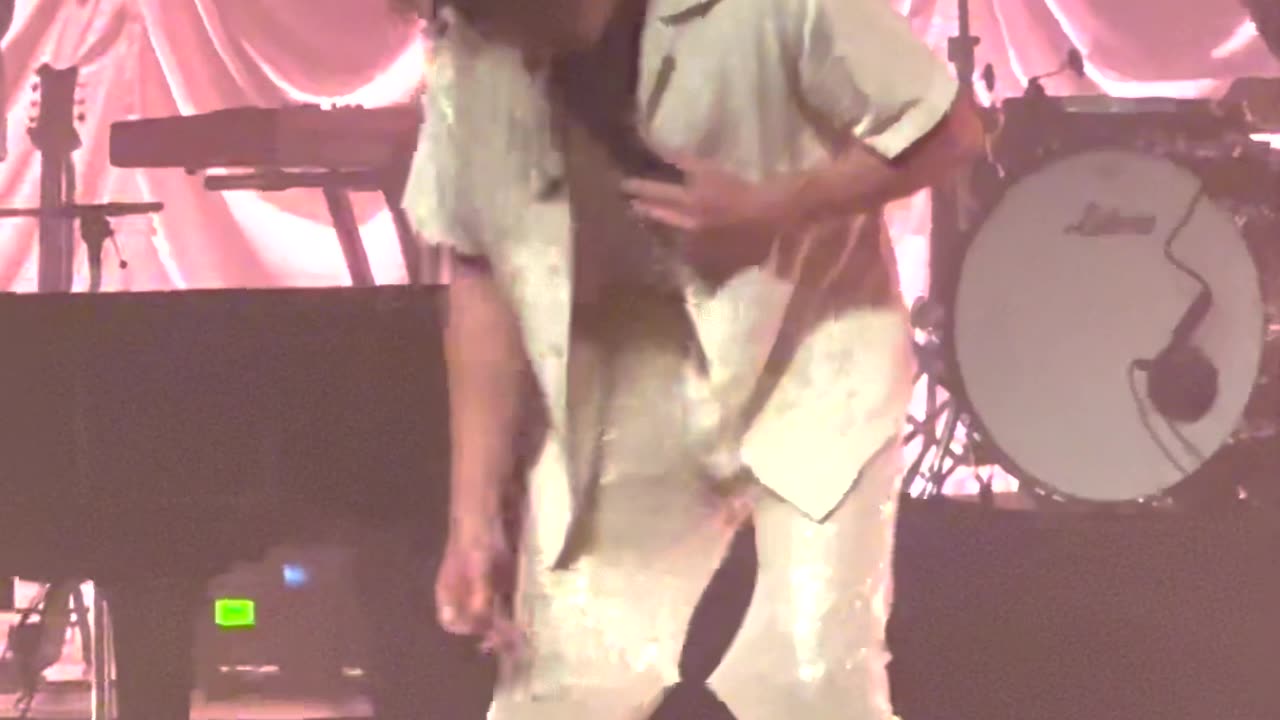 Loose Thread Ties Sparkly Pants Together At Knees