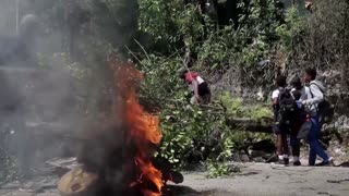 Haitians take to streets, demanding protection from gang violence