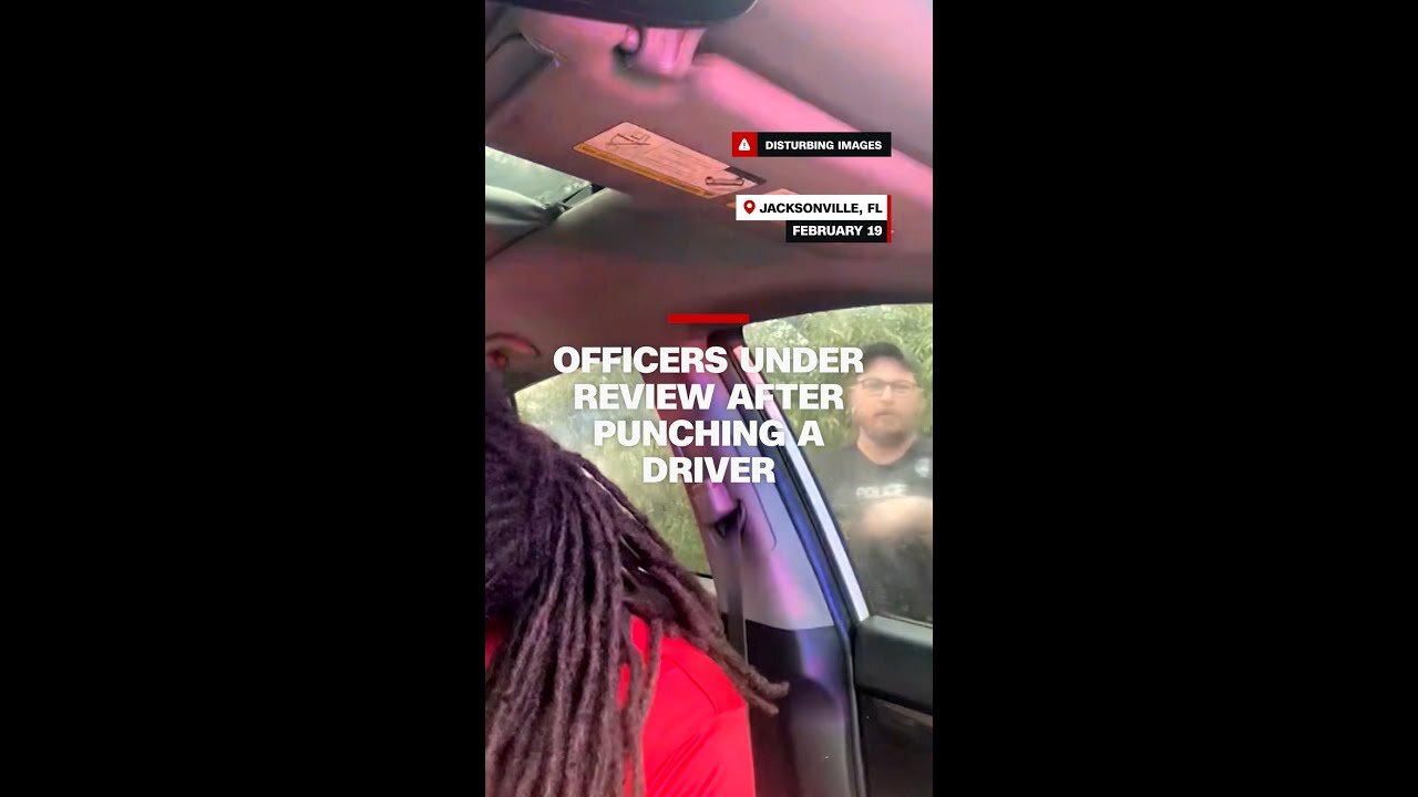 Officers under review after punching a driver