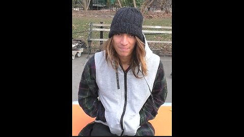 Luodong Massages Man With Long Hair At Washington Square Park