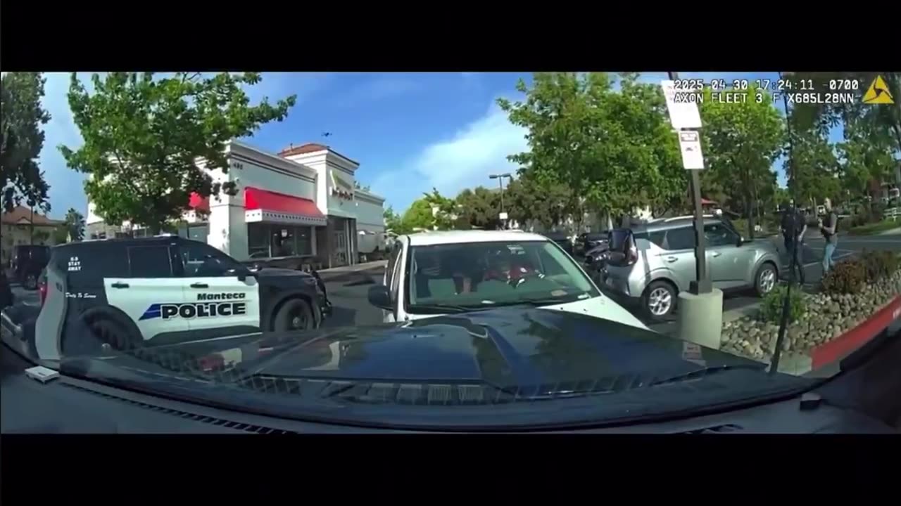 Man shot dead after repeatedly ramming two police cars