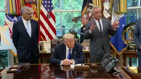 President Donald Trump signs executive orders