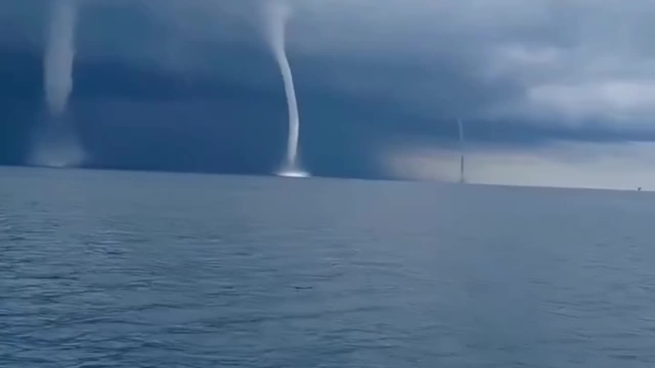 JUST IN - Spectacular footage captures five waterspouts forming off the coast of Italy