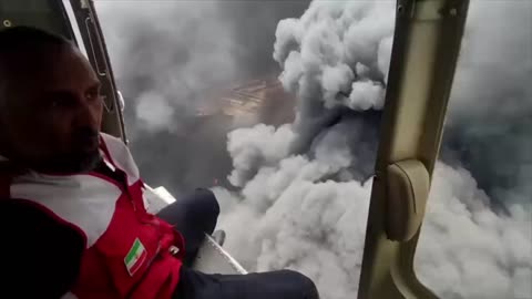 Extinguishing the fire at Rajai Port in Iran