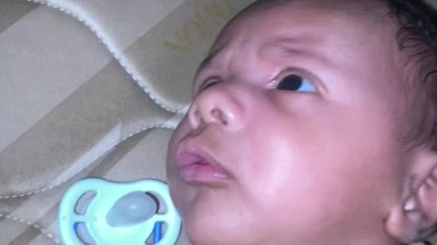 Baby Outraged by His Dad's Snoring