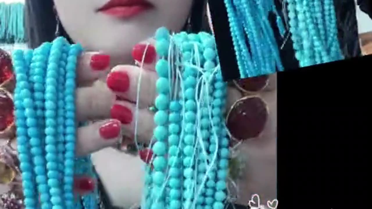 250430-5 Selected natural raw turquoise is polished into round beads