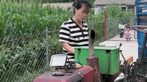 Beautiful lady tractor driver