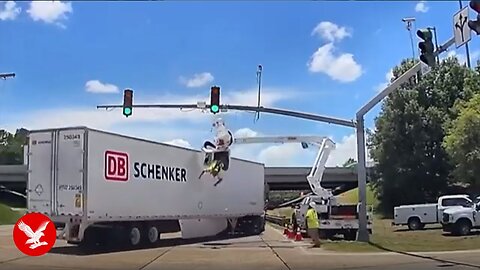 Electrical worker left dangling upside down after truck smashes into cherry picker