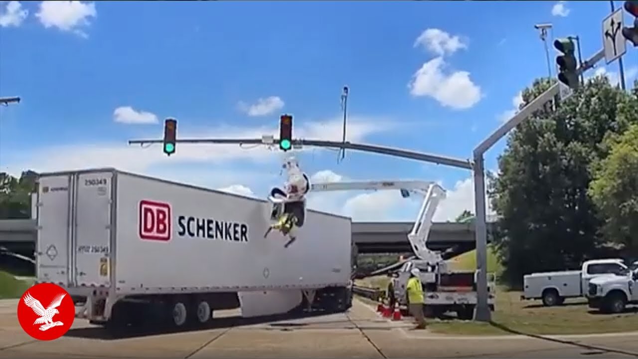 Electrical worker left dangling upside down after truck smashes into cherry picker