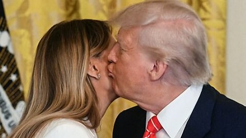 Trump kisses Melania as she goes on stage to speak on Mother's Day