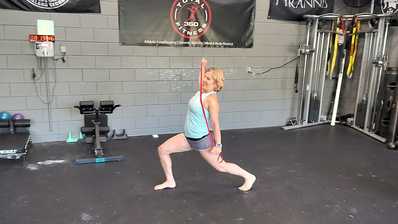 Banded Walking Lunge Scapular Squeeze