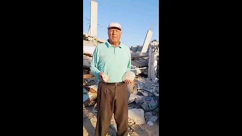 An elderly Palestinian man near his destroyed home.