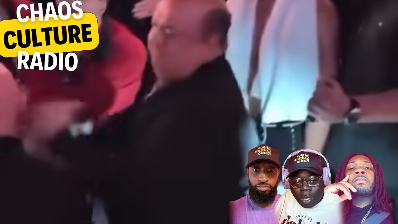 Paul Heyman Shoving A Young Fan