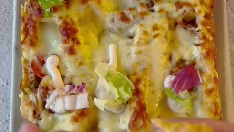 Lets make a simple delicious baked bread with chicken and cheese on top