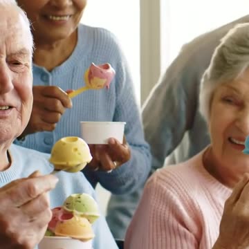 Happy seniors eating ice cream in a nursing home #caregiver