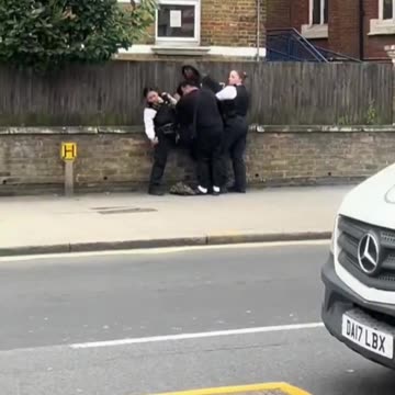 Usual suspect in London spits at a female cop. They hate women.