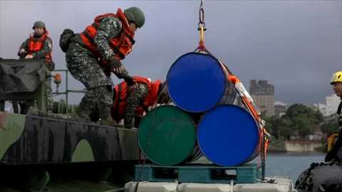 Taiwan sets explosives at river mouth as China drills approach