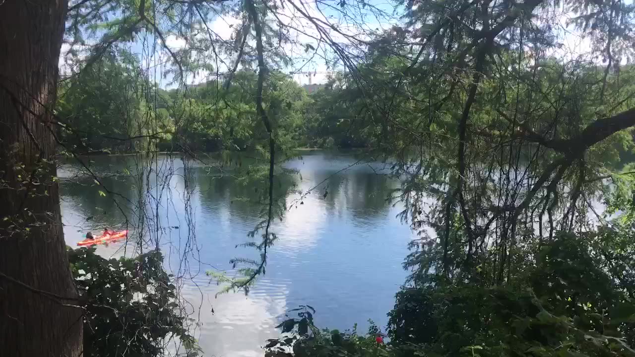 They are boating in the lake, Have a nice day.