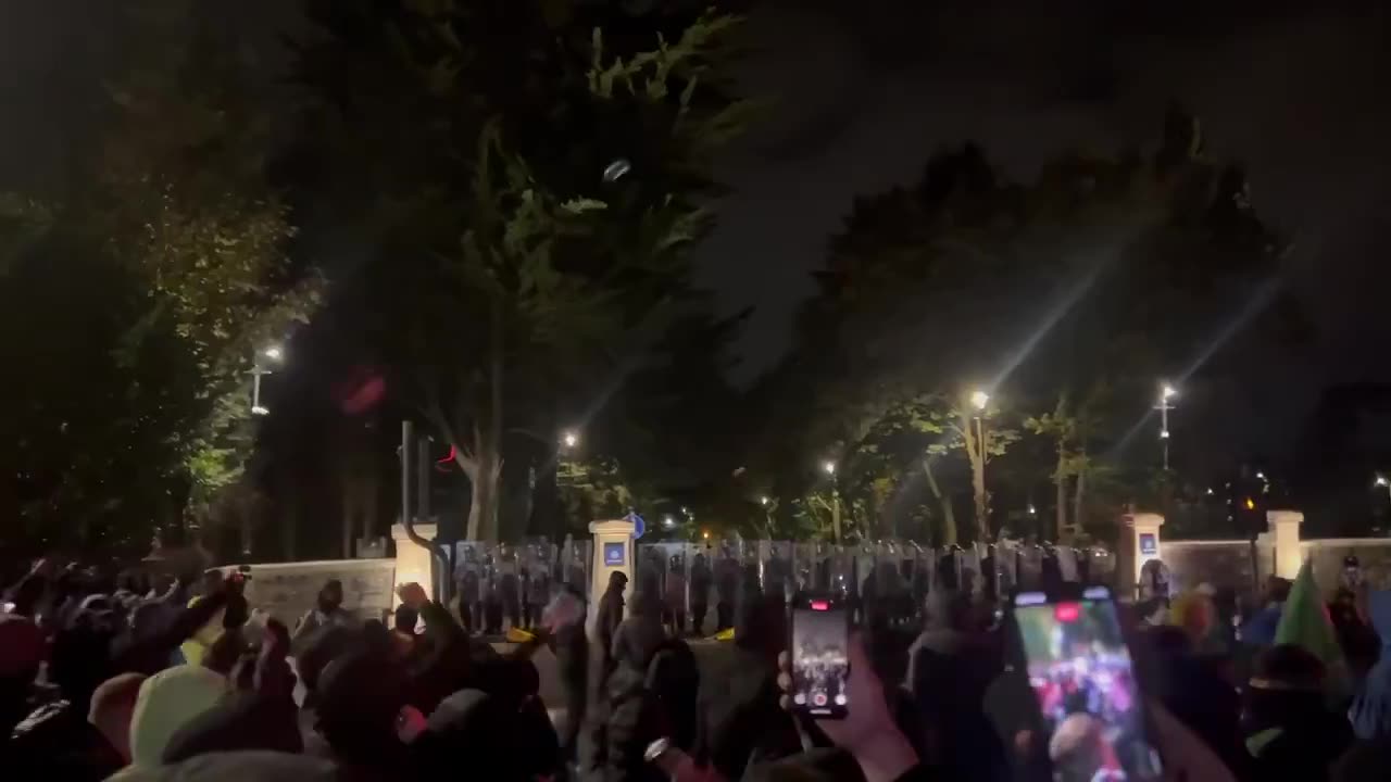 Large crowds of angry locals hurl glass bottles at Gardaí by outside Citywest