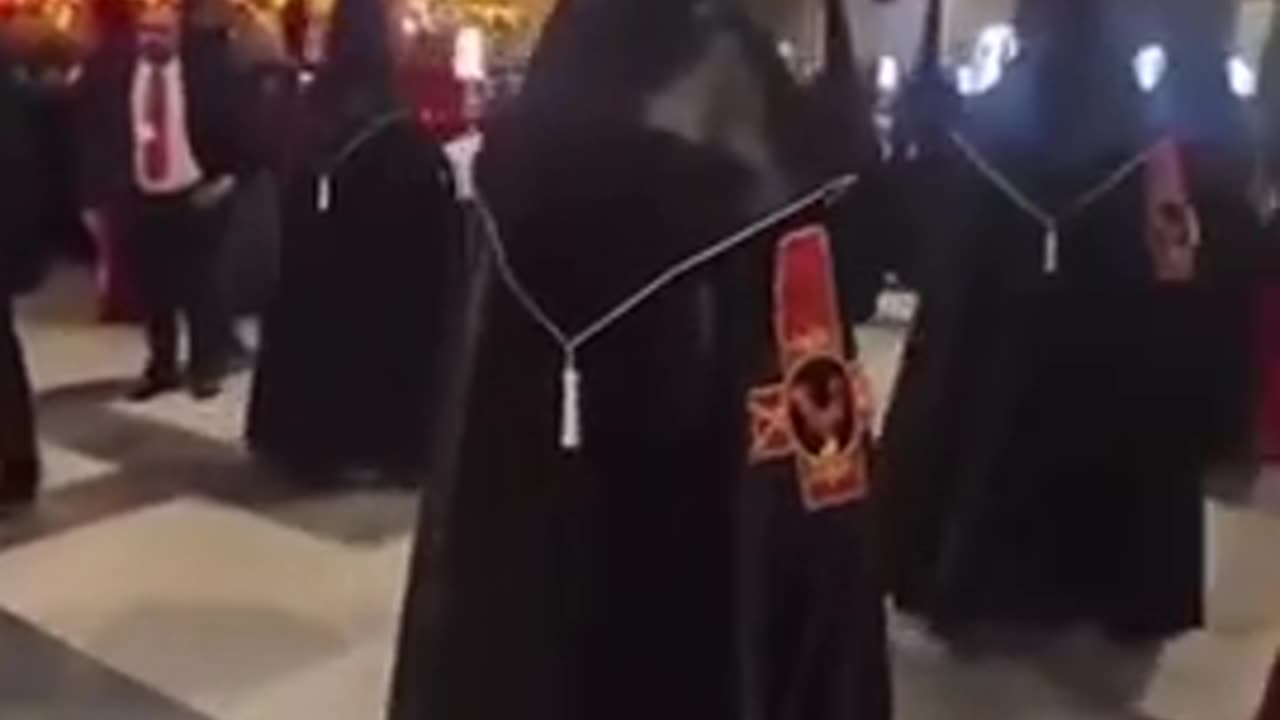 Why is the cross upside down - weird parade