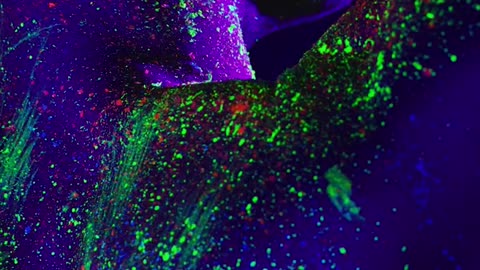 Abstract image of a man stained with phosphorescent paint
