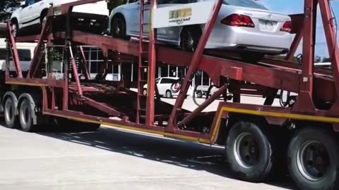 Unlock the Secrets: How Cars Are Expertly Loaded on an Open Trailer! 🚗💨