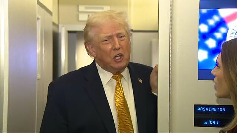 President Donald J. Trump speaks to reporters aboard Air