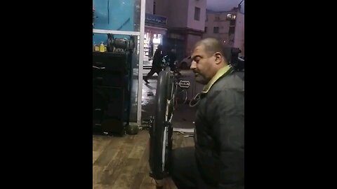 He leveled the bicycle with his head.